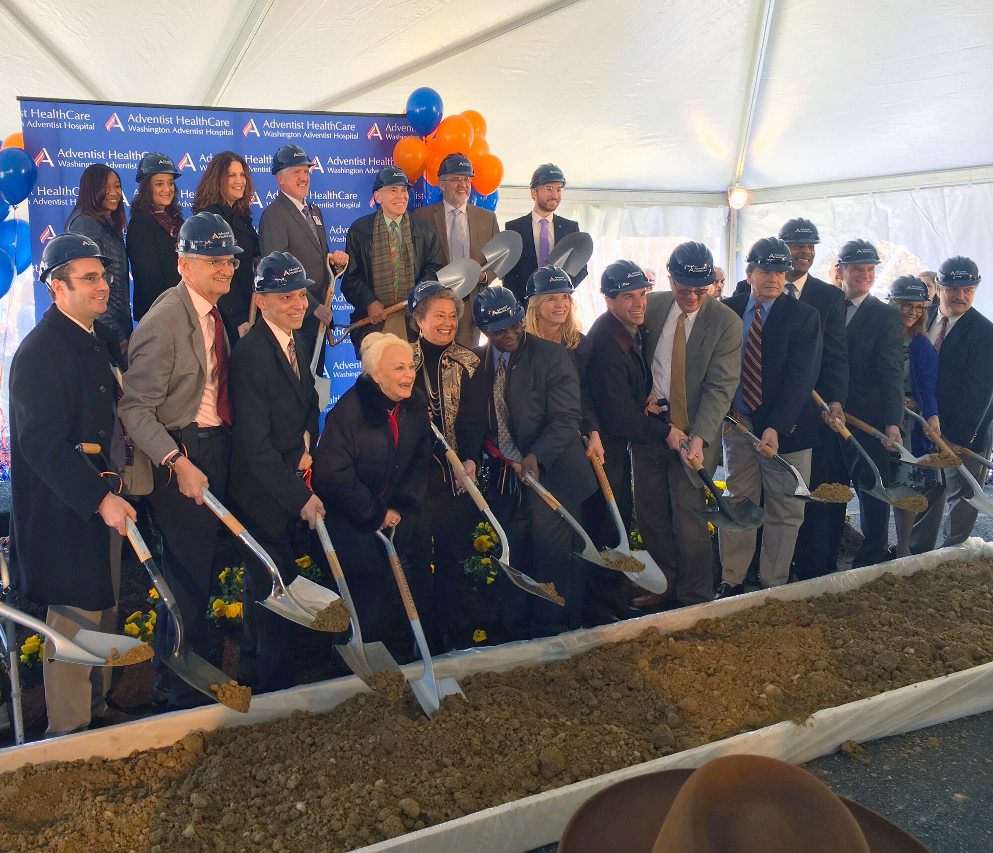 Dan Marren (front row, eighth from left), director of the AEDC Hypervelocity Wind Tunnel Test facility also called “Tunnel 9” located in White Oak, Md., participates in the ground breaking ceremony March 7 for the Washington Adventist Hospital (WAH), a $330 million project. The event took place adjacent to the Federal Research Center, the location of AEDC White Oak test facility and the U.S. Food and Drug Administration headquarters. WAH will become a part of the White Oak Science Gateway where they will provide healthcare to the White Oak community. (Courtesy Photo)