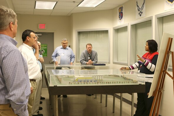 A group of representatives with NORESCO, the energy services company selected to carry out the Energy Saving Performance Contract at Arnold Air Force Base, recently took a tour of the test facilities at AEDC. NORESCO began a nine-month Investment Grade Audit to determine how to proceed with the ESPC. Pictured right is Raquel March, of ATA Public Affairs, speaking to NORESCO staff at the Aeropropulsion System Test Facility. (U.S. Air Force photo/Holly Fowler)