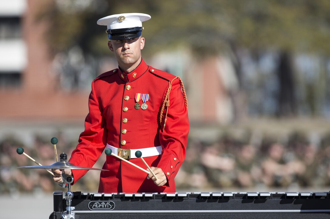 U.S. Marine Corps Sgt. Tyler Hildreth, with the Commandants own Drum and Bugle Corps, performs at the Peatross Parade Deck on Marine Corps Recruit Depot, Parris Island, S.C., on Mar. 15, 2016. The Drum and Bugle Corps, Silent Drill Platoon and Marine Corps Color Guard perform annually on Parris Island. (U.S. Marine Corps photo by Michael T. Kaneshige/ Released)