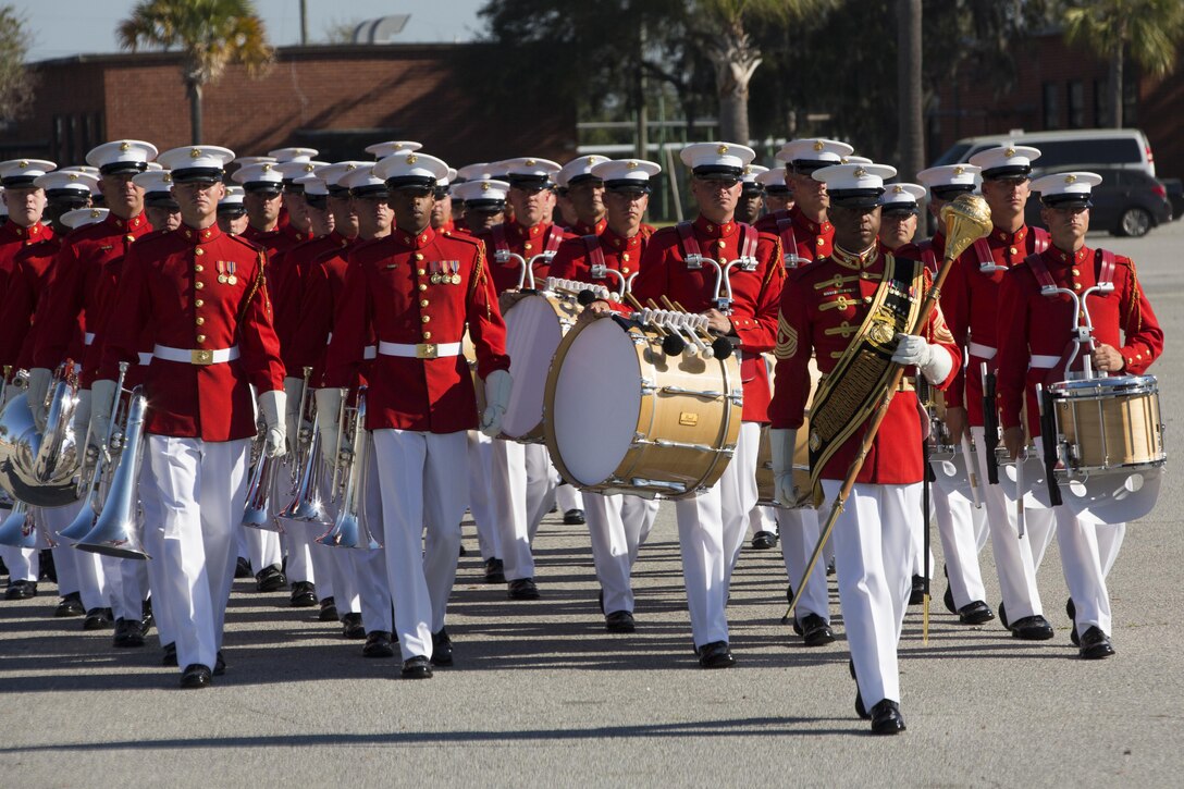 The U.S. Marine Corps Commandants own Drum and Bugle Corps march before performing at the Peatross Parade Deck on Marine Corps Recruit Depot, Parris Island, S.C., on Mar. 15, 2016. The Drum and Bugle Corps, Silent Drill Platoon and Marine Corps Color Guard perform annually on Parris Island. (U.S. Marine Corps photo by Lance Cpl. Richard Currier/Released)