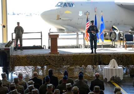 U.S. Navy Adm. Cecil D. Haney, U.S. Strategic Command (USSTRATCOM) commander (right), provides remarks during an award ceremony honoring the 2nd Bomb Wing at Barksdale Air Force Base, La., March 21, 2016. During the ceremony, Haney and Mr. W. Gary Gates (not pictured), Strategic Command Consultation (SCC) Committee member, presented the 2015 Omaha Trophy, strategic bomber category, to U.S. Air Force Col. Kristin Goodwin, 2nd Bomb Wing commander (not pictured), and U.S. Air Force Chief Master Sgt. Tommy Mazzone, 2nd Bomb Wing command chief master sergeant (not pictured), in recognition of the wing's contributions to USSTRATCOM's global strategic missions. The Omaha Trophy, which dates back to the U.S. Air Force's Strategic Air Command, was originally created by the SCC in 1971. At the time, a single trophy was presented annually as a token of appreciation to USSTRATCOM's best wing. Since then, the tradition has evolved to unit-level awards that recognize the command's premier intercontinental ballistic missile (ICBM) wing, ballistic missile submarine, strategic bomber wing and global operations (space/cyberspace) unit. This year, a new category was added to include the combatant command's top strategic aircraft wing. (U.S. Air Force photo by Senior Airman Benjamin Raughton) Story Available: https://www.stratcom.mil/news/2016/595/-/
