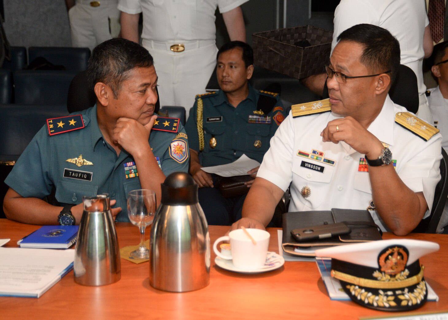160319-N-CZ848-013 
CHANGI, Singapore (Mar. 19, 2016) – Rear Admiral Achmad Taufiqoerrochman, Western Fleet Commander, Tentara Nasional Indonesia-Angkatan Laut, left and Commodore Narciso Vingson, Deputy Commander, Philippine Fleet, speak during multilateral talks between the U.S., Republic of Singapore, Tentara Nasional Indonesia-Angkatan Laut, Royal Malaysian and Philippine navies aboard USS Blue Ridge (LCC 19). The multilateral talks are being held to enhance cooperation and strengthen relationships to best provide security and stability in the Indo-Asia Pacific. (U.S. Navy photo by Mass Communication Specialist 2nd Class Jason Kofonow/Released)