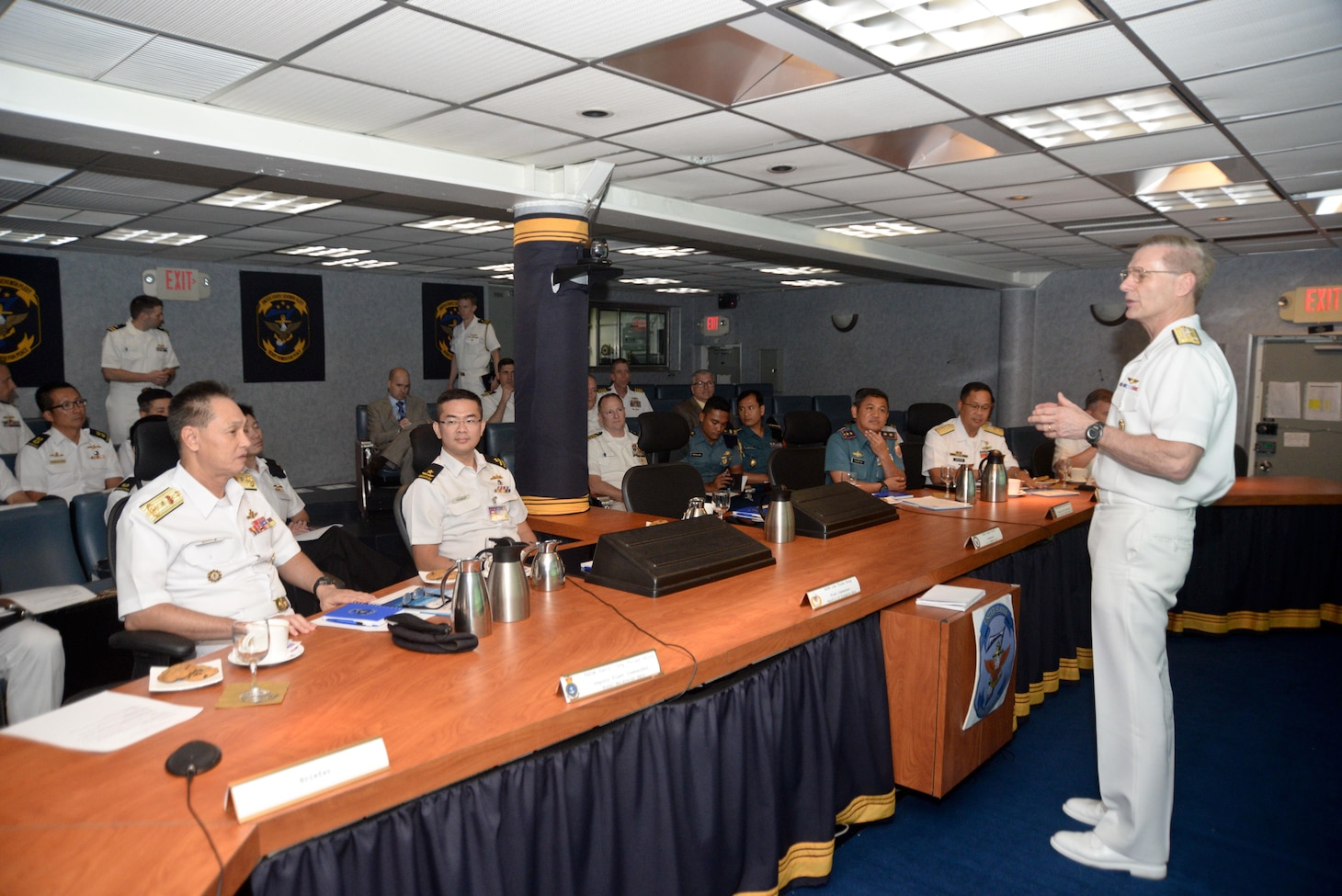 160319-N-CZ848-024
CHANGI, Singapore (Mar. 19, 2016) – Vice Adm. Joseph Aucoin, commander, U.S. 7th Fleet, right, addresses senior leaders from U.S., Republic of Singapore, Tentara Nasional Indonesia-Angkatan Laut, Royal Malaysian and Philippine navies during multilateral talks aboard USS Blue Ridge (LCC 19). The multilateral talks are being held to enhance cooperation and strengthen relationships to best provide security and stability in the Indo-Asia Pacific. (U.S. Navy photo by Mass Communication Specialist 2nd Class Jason Kofonow/Released)