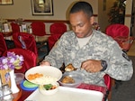 Army Pvt. Byron Brown, assigned to 520th Maintenance Company, 194th Combat Sustainment Support Battalion, eats at a dining facility at Camp Humphreys, South Korea. Despite South Korea’s ban on poultry items from the U.S., warfighters who eat at DFACs across the peninsula continue to eat fresh chicken, thanks to DLA Troop Support Pacific.