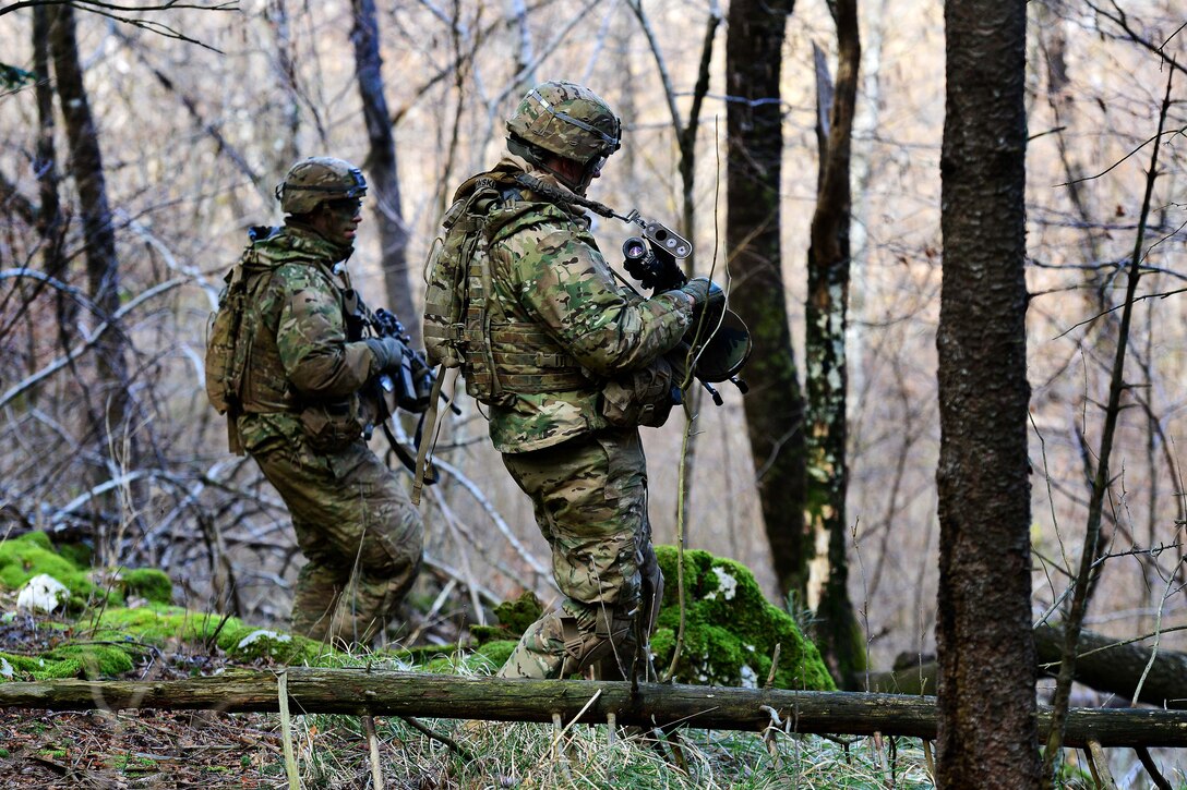 U.S. soldiers move through the woods during a live-fire exercise as part of Exercise Rock Sokol at Pocek Range in Postonja, Slovenia, March 9, 2016. Army photo by Paolo Bovo