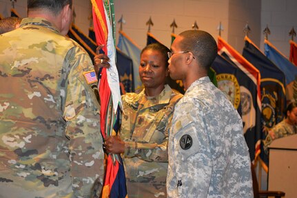 Command Sgt. Maj. Sharon Campbell, accepts the 94th Training Division colors from the commander, Brig. Gen. Steven W. Ainsworth, during a change of responsibility ceremony at Fort Lee, Va., March 18, 2016. By accepting the colors, Campbell became the first female to hold the command sergeant major position. The command sergeant major is the commander’s primary advisor and sets the standard across the command for enlisted Soldiers. Campbell will now be responsible for the Soldiers’ performance, training, appearance, and conduct. She’ll also be providing direction and guidance to more than 35 other command sergeants major assigned to subordinate units.