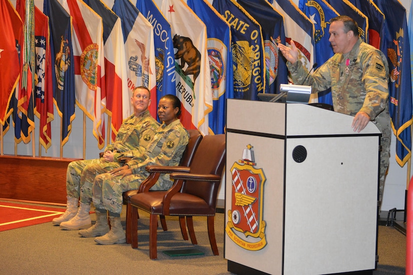 Brig. Gen. Steven W. Ainsworth, the 94th Training Division commander, and Command Sgt. Maj. Sharon Campbell, the 94th TD’s new command sergeant major, listens as Command Sgt. Maj. Arlindo Almeida, the division’s outgoing command sergeant major delivers his farewell address during a change or responsibility ceremony, Fort Lee, Va., where Almeida officially transferred his senior noncommissioned officer responsibilities to Campbell making her the division’s first female command sergeant major March 18, 2016.