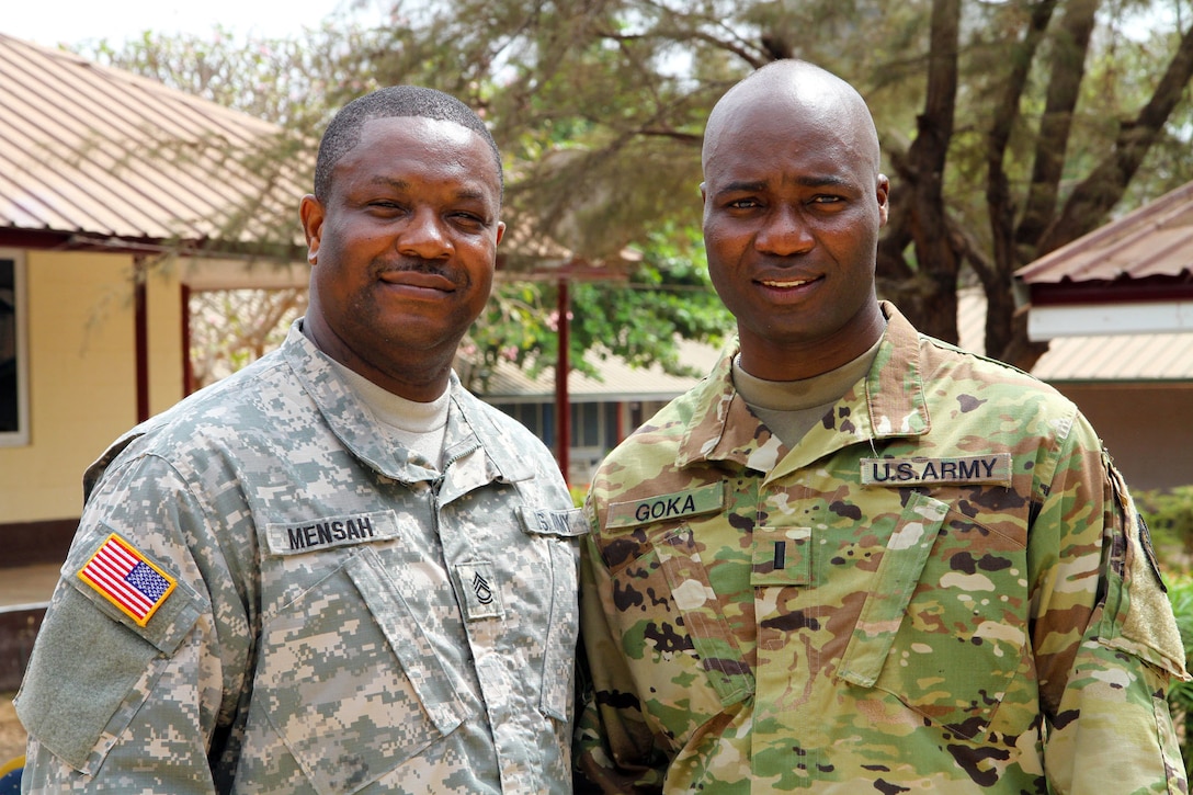 Active Guard Reserve Sgt. 1st Class Solomon Mensah, a member of Medical Readiness Training Exercise 16-2 command and control team and pay agent from the 3rd Medical Command (Deployment Support) unit at Fort Gillem, Ga., poses with 1st Lt. Frank Goka, a mobilized Army Reserve Soldier assigned to Fort Hood, Texas, participated in MEDRETE 16-2, from Feb. 3-26, at the 37 Military Hospital, Accra, Ghana. Both Mensah and Goka are originally from Ghana. Mensah and Goka were essential to MEDRETE 16-2 with helping the U.S. medical team establish relationships amongst the Ghanaian Defense Force and medical professionals at the 37 Military Hospital. (U.S. Army Africa photo by Maj. Satomi Mack-Martin)