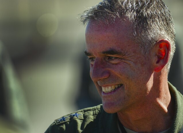 Maj. Gen. Silveria, United States Air Force Warfare Center commander, greets friends and family after his final flight at Nellis Air Force Base, Nev., March 10, 2016. Silveria has been commander of the U.S Air Force Warfare Center since February 2014. (U.S. Air Force photo by Airman 1st Class Kevin Tanenbaum)