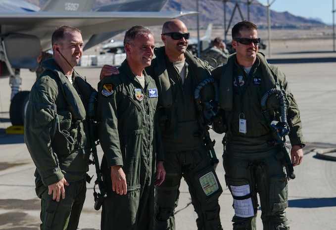 Maj. Gen. Silveria, United States Air Force Warfare Center commander, poses with fellow pilots after his final flight at Nellis Air Force Base, Nev., March 10, 2016. Silveria has been commander of the U.S Air Force Warfare Center since February 2014. (U.S. Air Force photo by Airman 1st Class Nathan Byrnes)
