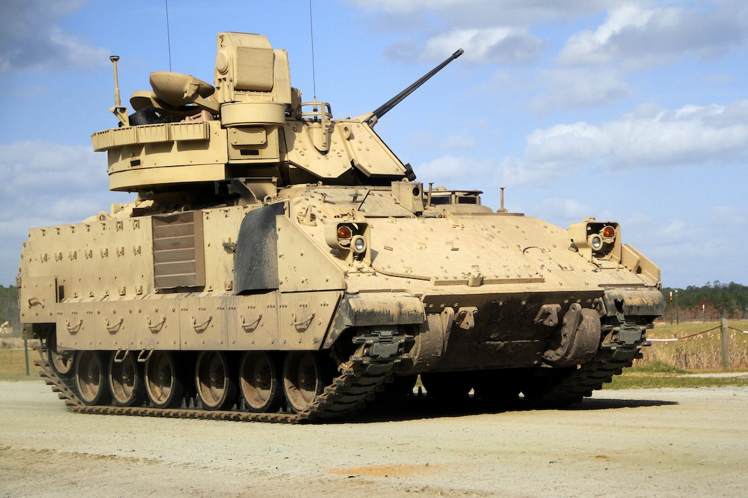 An M3A3 Bradley fighting vehicle travels down a dirt road after completing it’s firing mission during a live-fire training exercise at Fort Stewart, Ga., March 10, 2016. Army photo by Pfc. Payton Wilson