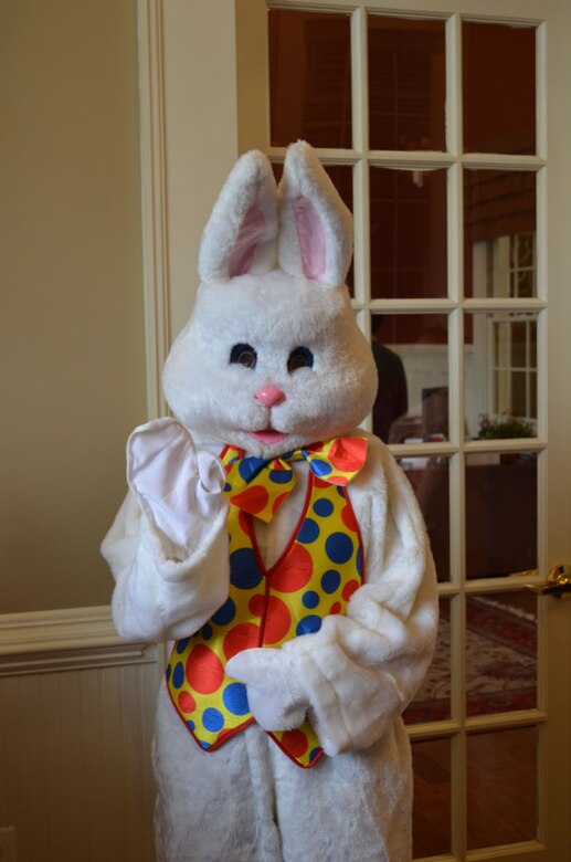 MARINE CORPS BASE QUANTICO, Va. — The Easter bunny waves as children head outside to search for eggs during the annual Marine Corps Base Quantico Easter Egg Hunt. 