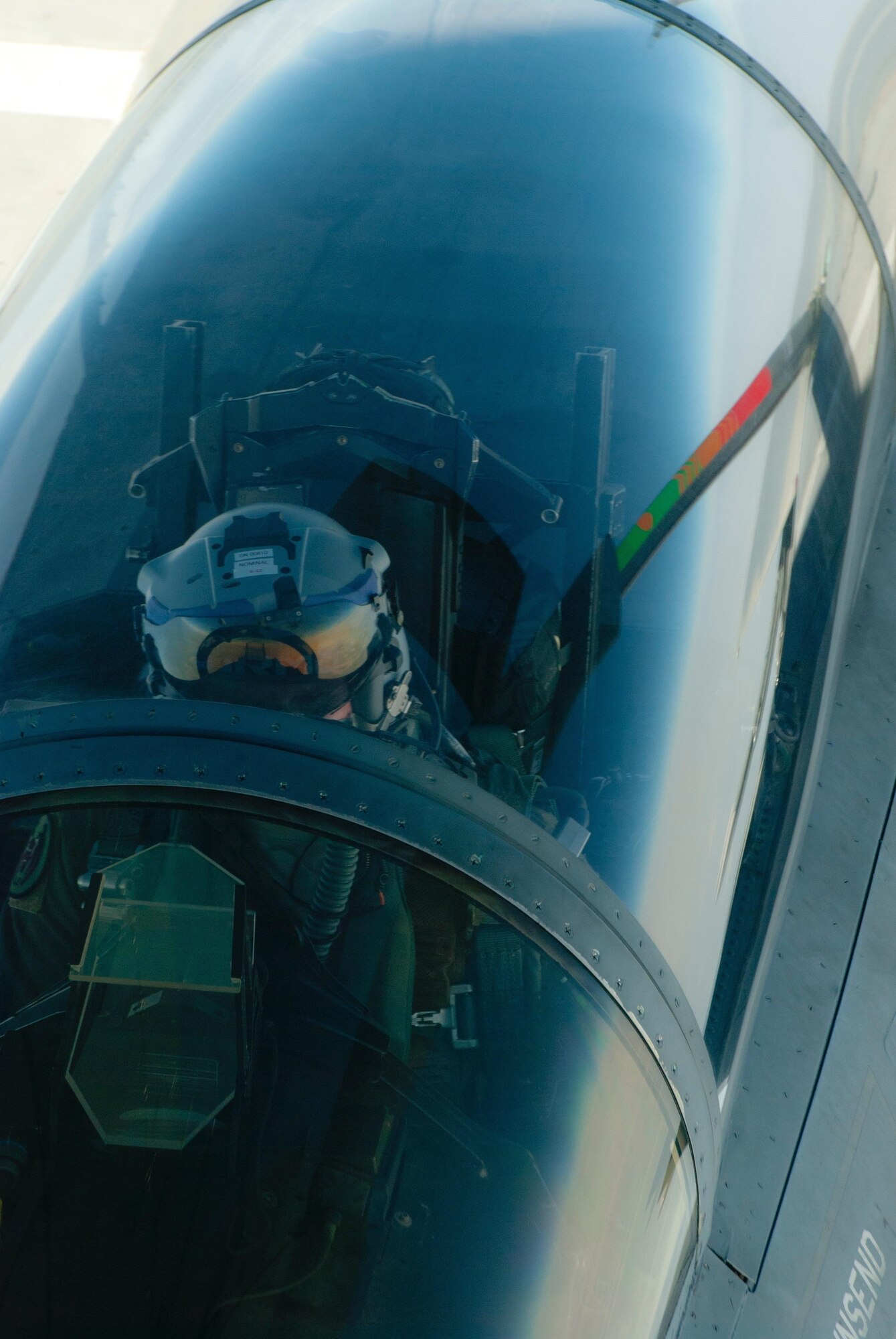 A U.S. Air Force F-15C Eagle fighter pilot with the 44th Fighter Squadron holds steady while a peforming a aerial refueling procedure with a  KC-135 Stratotanker from the 909th Air Refueling Squadron, March 21, 2016, off the coast of Japan. The inflight refueling exercise demonstrated the flying units' capability to engage in long-range, extended flight operations. (U.S. Air Force photo by Senior Airman Peter Reft/Released)