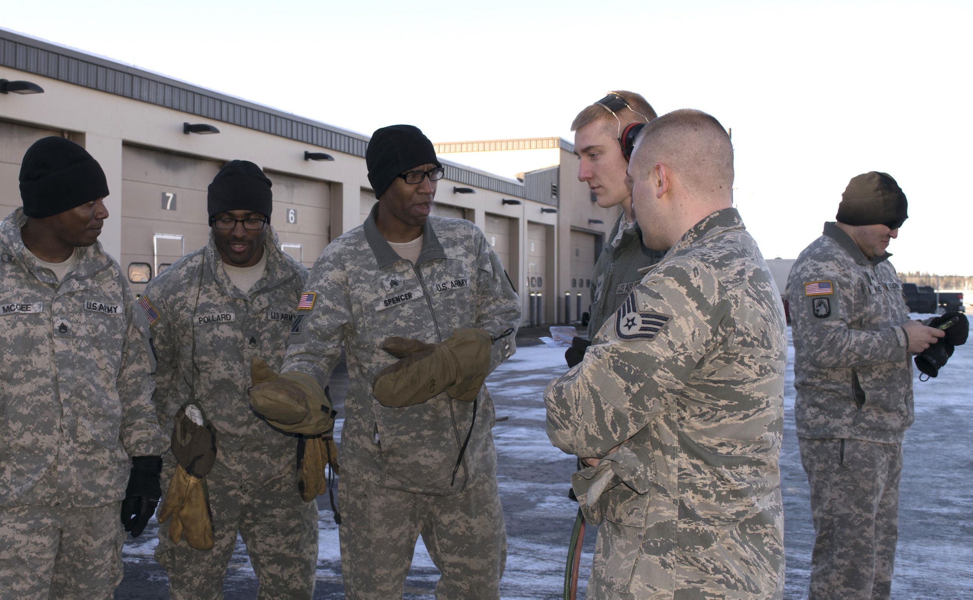 U.S. Airmen and Soldiers gathered for training March 1, 2016, at Eielson Air Force Base, Alaska. Airmen from the 354th Logistics Readiness Squadron fuels operations flight gave briefings on the different sections of the flight and how they differ from the Army’s fuels operations. (Courtesy  photo by U.S. Air Force Airman 1st Class Amber Crain/Released)