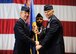 Maj. Gen. Glen VanHerck (right) assumes command of the U.S. Air Force Warfare Center from Gen. Hawk Carlisle, commander Air Combat Command , during a change of command ceremony at the Thunderbirds hangar at Nellis Air Force Base, Nev., March 22. The USAFWC exists to ensure deployed forces are well trained and well equipped to conduct integrated combat operations. From testing and tactics development programs to training schools and venues, the USAFWC provides Airmen with proven and tested technology, the most current tactics, superb academic training and a unique opportunity to practice integrated force employment. (U.S. Air Force photo by Senior Airman Jake Carter)