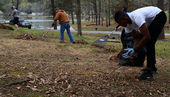 U.S. Airmen clean up debris at the 20th Force Support Squadron Wateree Recreation Area near Camden, S.C., March 19, 2016. The Wateree Recreation Area offers camping, fishing, and other recreational activities to service members and their families. (U.S. Air Force photo by Airman 1st Class Destinee Dougherty)