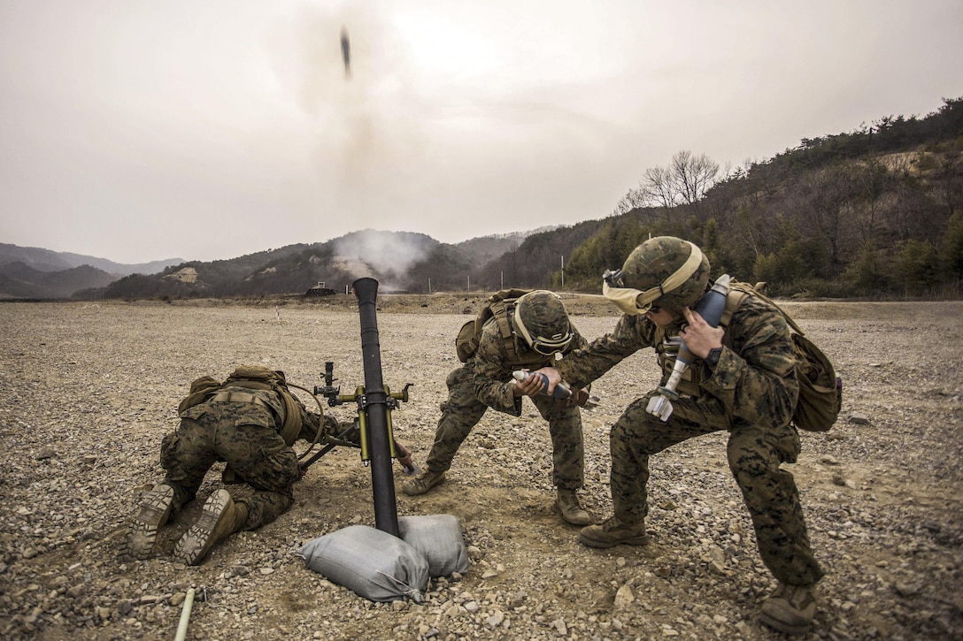 Marines fire an 81mm training mortar with the M252A2 mortar system during Ssang Yong 16 at Suseongri, South Korea, March 15, 2016. The exercise familiarizes American forces with the Korean Peninsula and contributes to security and stability in the Asia-Pacific region. Marine Corps photo by Cpl. Darien J. Bjorndal