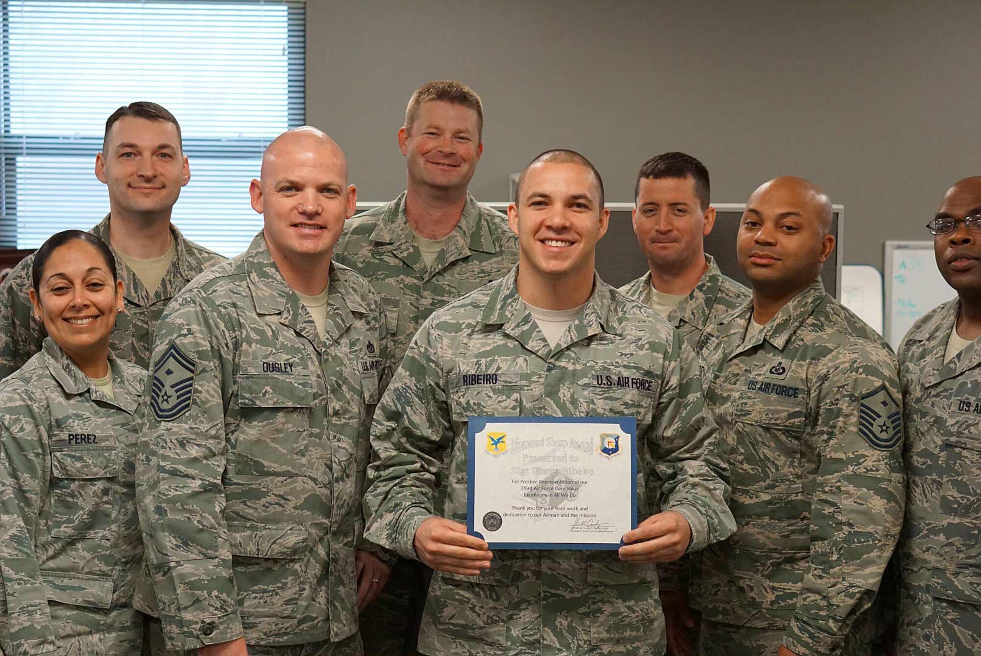 Staff Sgt. Eliezer Ribeiro, 436th Logistics Readiness Squadron quality assurance evaluator, is presented the Dover First Sergeant Council’s Diamond Sharp Award March 17, 2016, at Dover Air Force Base, Del. Ribeiro, a native of Salvador, Brazil, performs inspections and evaluations on personnel and equipment providing squadron leadership with an assessment of the unit’s ability to perform key logistics processes by ensuring standardized, repeatable, technically compliant process execution, while promoting a culture of professional excellence and personal responsibility. He also serves as his unit’s safety representative ensuring effective safety and health requirements are carried out. (Courtesy photo)