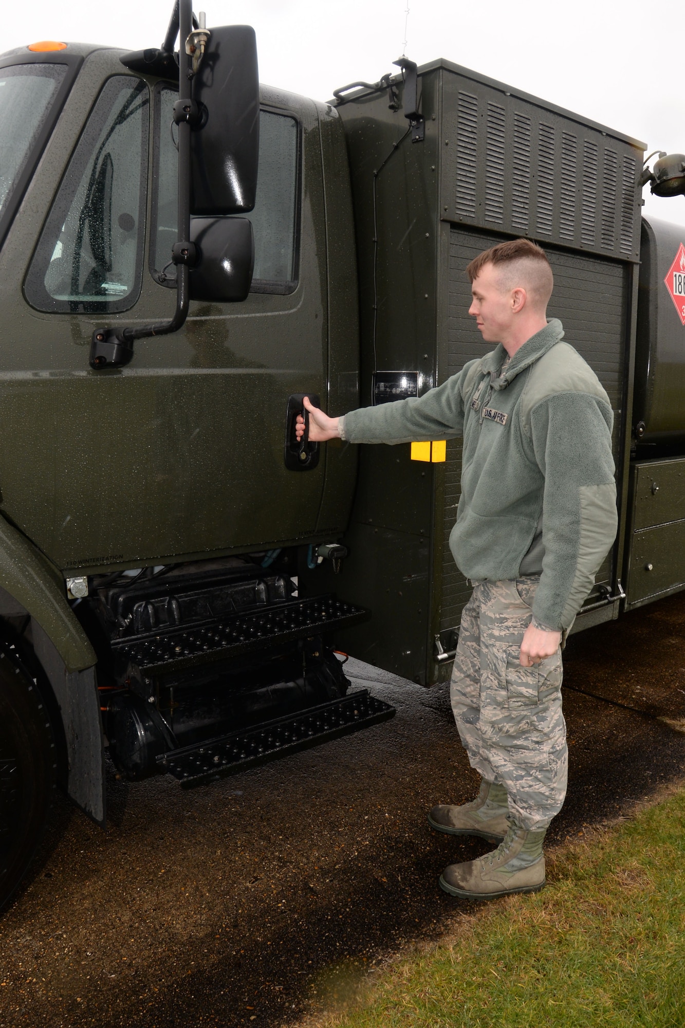 U.S. Air Force Airman 1st Class George Palmer, 100th Logistics Readiness Squadron mobile distribution operator, gets into a fuel truck at the fuels compound March 9, 2016, on RAF Mildenhall, England. Recently the fuel system that supplied the underground refueling capability received system upgrades. For nearly 12 months, all requests to refuel home station aircraft had to be “trucked” versus using the underground refueling system. (U.S. Air Force photo by Gina Randall/Released)