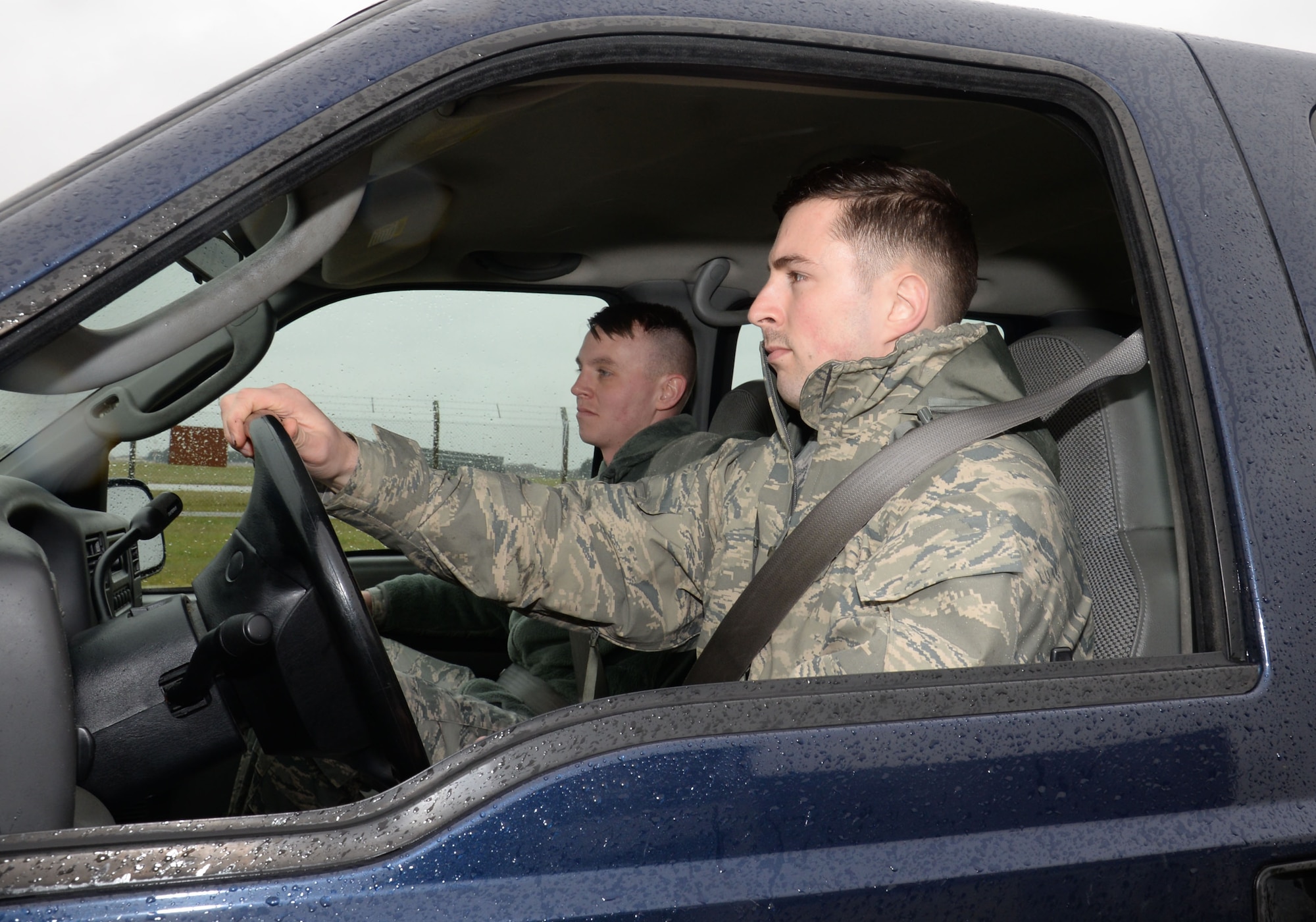 U.S. Air Force Airman 1st Class George Palmer, left, 100th Logistics Readiness Squadron mobile distribution operator, and U.S. Air Force Staff Sgt. Dakota Ferris, 100th LRS NCO in charge of fixed facilities, head to the fuels compound in a government-owned vehicle March 9, 2016, on RAF Mildenhall, England. Fuels facilities are inspected daily, and are spread out across the base. (U.S. Air Force photo by Gina Randall/Released)