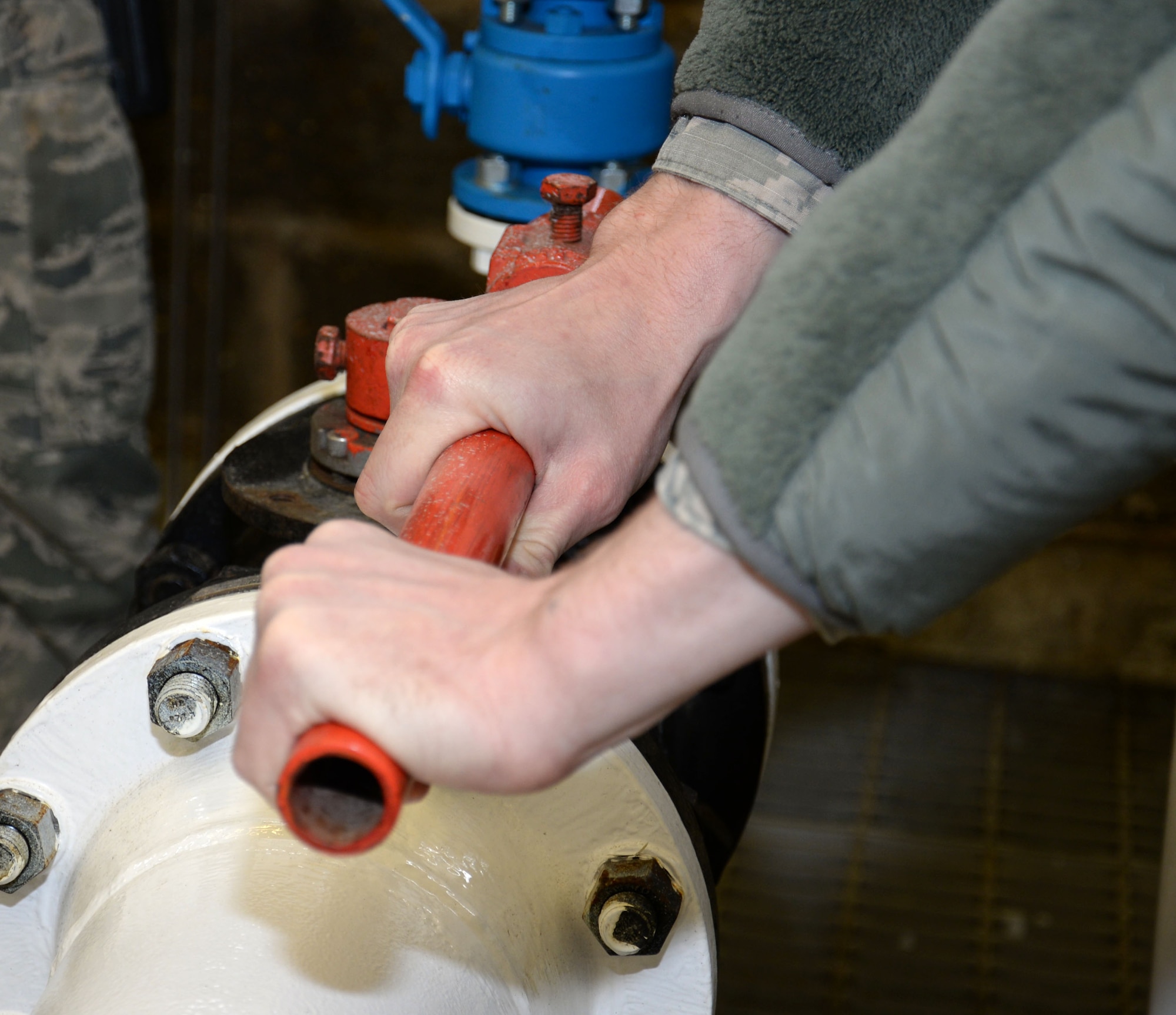 U.S. Air Force Airman 1st Class George Palmer, 100th Logistics Readiness Squadron mobile distribution operator, verifies the valve configuration prior to fuel movement March 9, 2016, on RAF Mildenhall, England. Recently, many of the personnel were deployed leaving the Airmen at home station to carry out the mission. (U.S. Air Force photo by Gina Randall/Released)