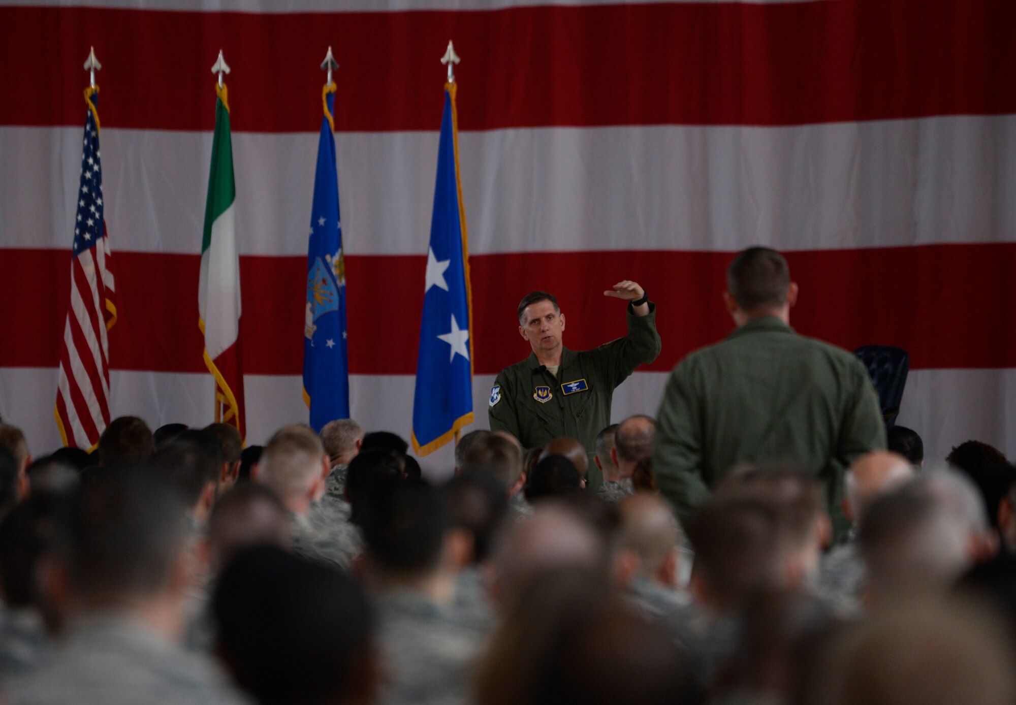 Lt. Gen. Timothy Ray, 3rd Air Force and 17th Expeditionary Air Force commander, speaks to 31st Fighter Wing Airmen during an all call, March 21, 2016, at Aviano Air Base, Italy. In his first visit to Aviano, Ray toured the base, met with Airmen and hosted an all call to thank Team Aviano members for their proven track record of generating airpower at a moment’s notice. (U.S. Air Force photo by Senior Airman Krystal Ardrey/Released) 