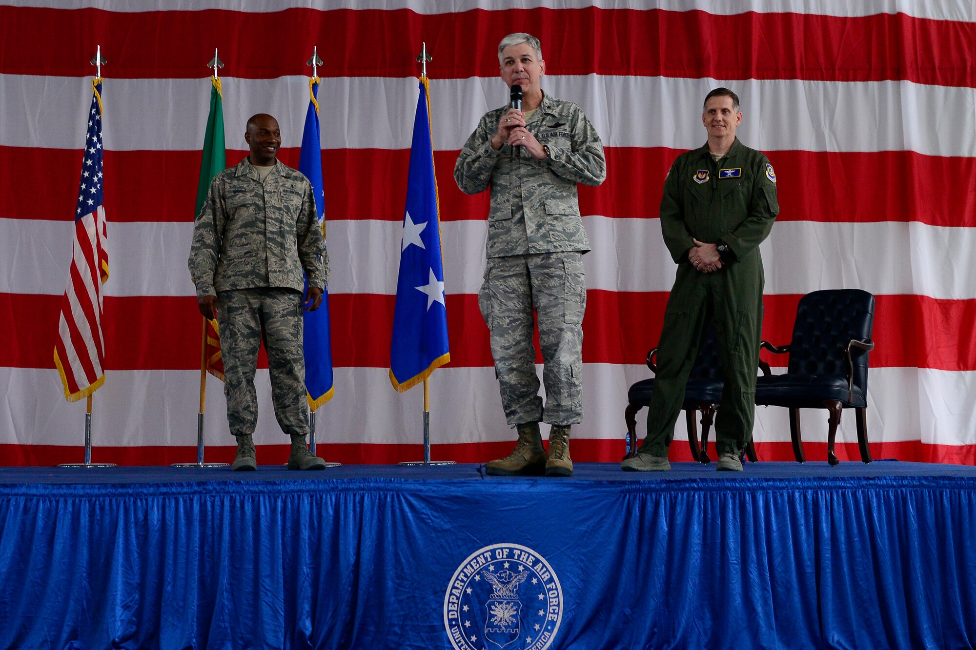 Brig. Gen. Barre Seguin, 31st Fighter Wing commander, introduces Lt. Gen. Timothy Ray, 3rd Air Force and 17th Expeditionary Air Force commander, and Chief Master Sgt. Kaleth Wright, 3rd AF and 17th EAF command chief, during an all call, March 21, 2016, at Aviano Air Base, Italy. During their visit, Ray and Wright toured the base, met with Airmen and hosted an all call to thank Team Aviano members for their proven track record of generating airpower at a moment’s notice. (U.S. Air Force photo by Senior Airman Krystal Ardrey/Released)