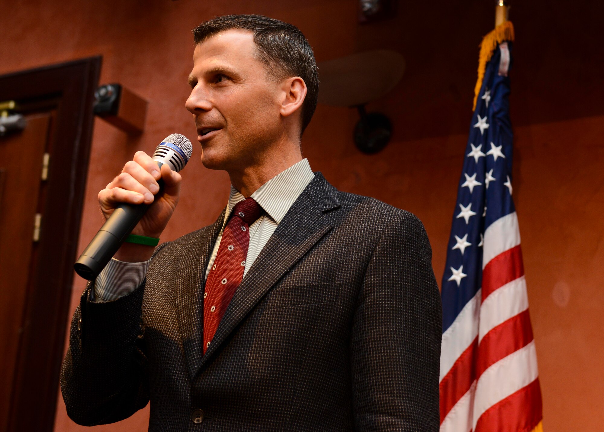 Robert Rogers, Mighty in the Land Ministry founder, talks to Team Aviano members about spiritual resiliency during a National Prayer Breakfast observance, March 21, 2016, at Aviano Air Base, Italy. Rogers shared his story about spiritual fitness after losing his wife and four children 12 years ago in a flood. (U.S. Air Force photo by Senior Airman Austin Harvill/Released)