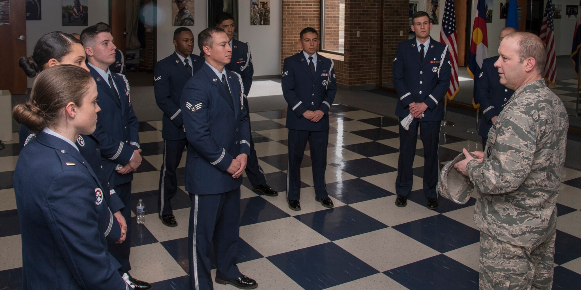 PETERSON AIR FORCE BASE, Colo. – Col. Douglas Schiess, 21st Space Wing commander thanks the High Frontier Honor Guard for a demonstration performed at building 1465 here March 14, 2016. The demonstration showcased the Honor Guard’s training, fitness, teamwork, precision and military bearing. (U.S. Air Force Photo by Craig Denton)
