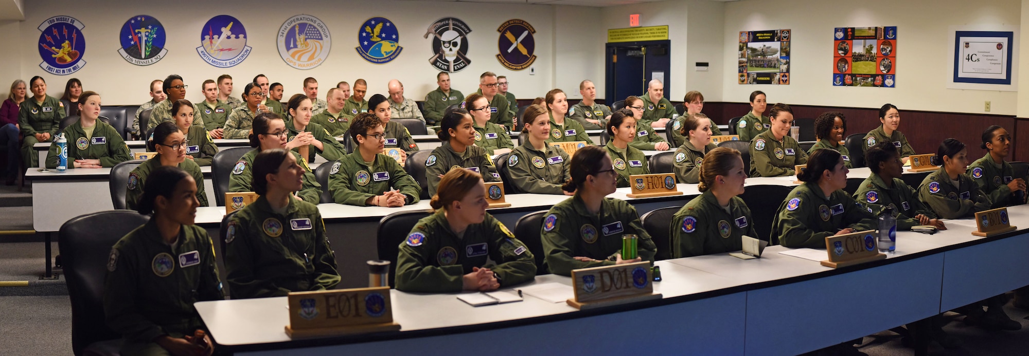All women missileer crews from Malmstrom Air Force Base, Mont., gather for a pre departure briefing before heading in the 13,800 square mile missile complex to complete their 24-hour alert March 22, 2016. On March 22, all of the nation’s alert intercontinental ballistic missile missileers and B-52 Stratofortress crews within the United States were crewed by women as part of Air Force Global Strike Command’s recognition of Women’s History Month. (U.S. Air Force photo/Airman Collin Schmidt)