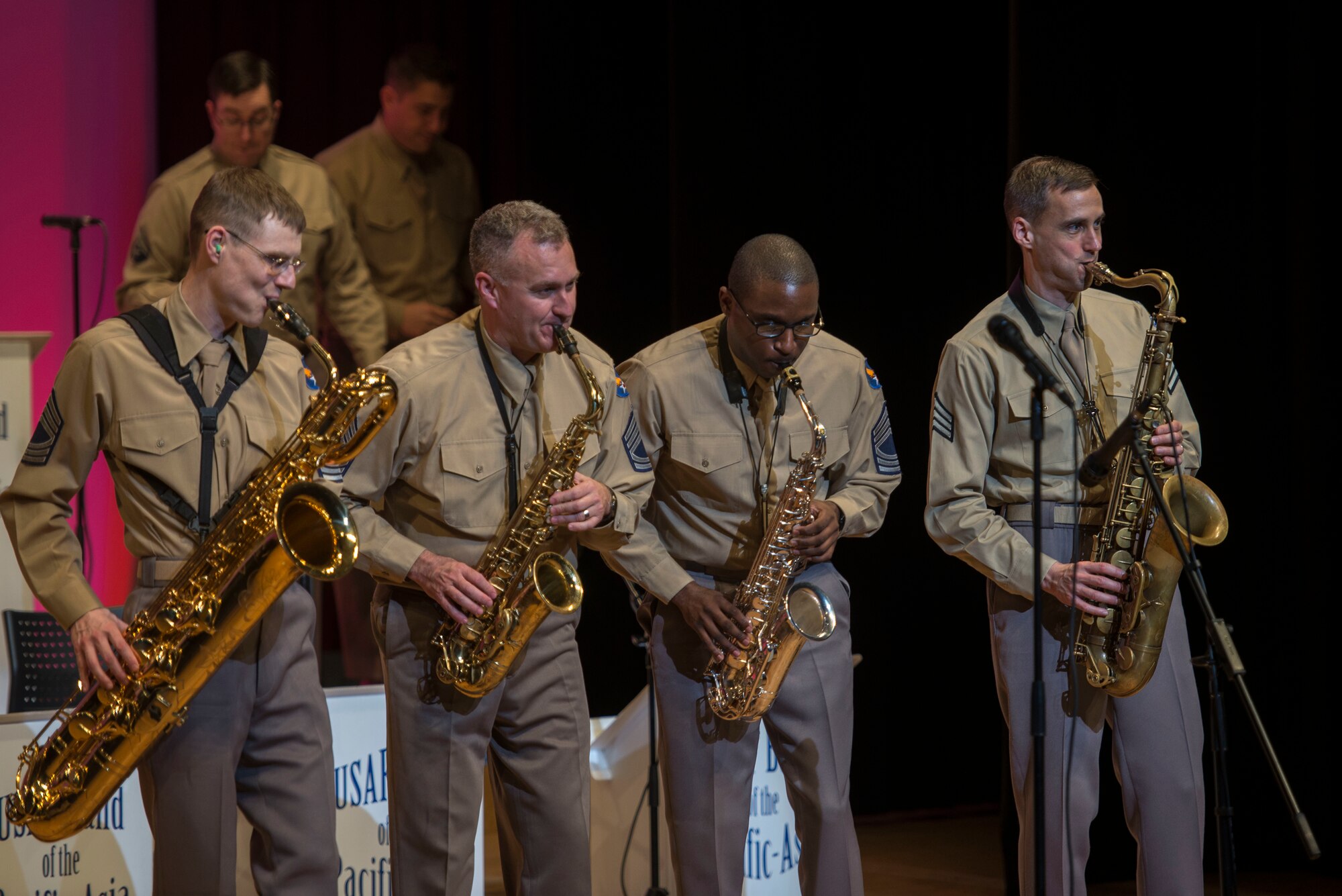 U.S. Air Force Band of the Pacific-Asia saxophonists play March 14, 2016, at the Pallet Civic Theater in Naha, Japan. The Pacific Showcase performed for locals six times at locations across the island of Okinawa. (U.S. Air Force photo by Senior Airman Omari Bernard)