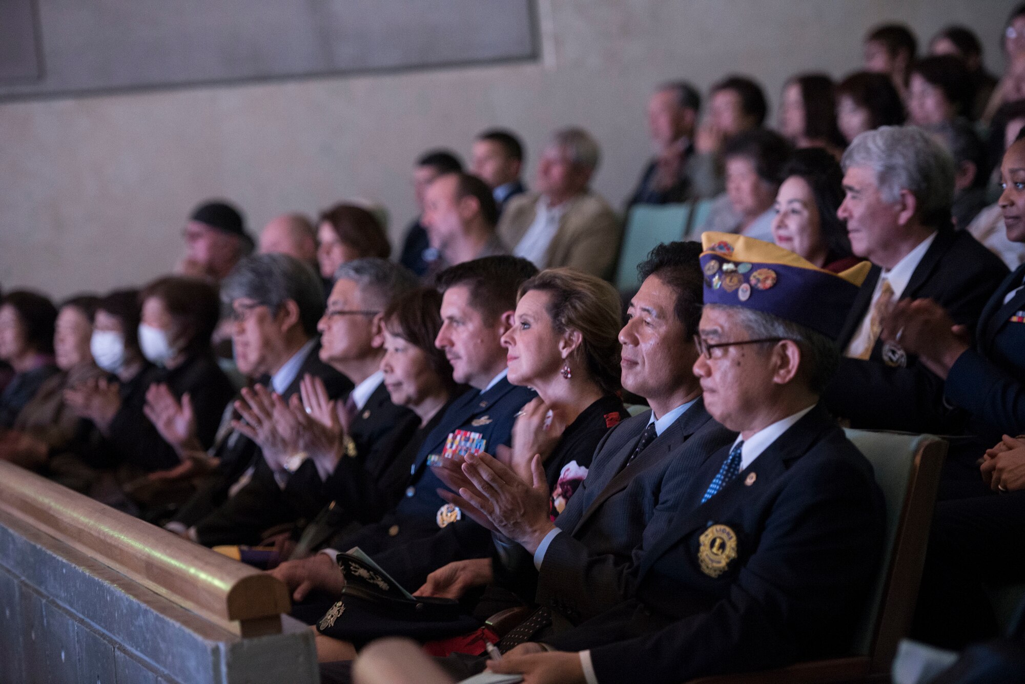 Japanese and Americans living on Okinawa enjoy the performance from the Pacific Showcase ensemble March 14, 2016, at the Pallet Civic Theater at Naha, Japan. The U.S. Air Force Band of the Pacific-Asia serves Pacific Air Forces' commander's outreach needs and objectives throughout their areas of responsibility through music. (U.S. Air Force photo by Senior Airman Omari Bernard)