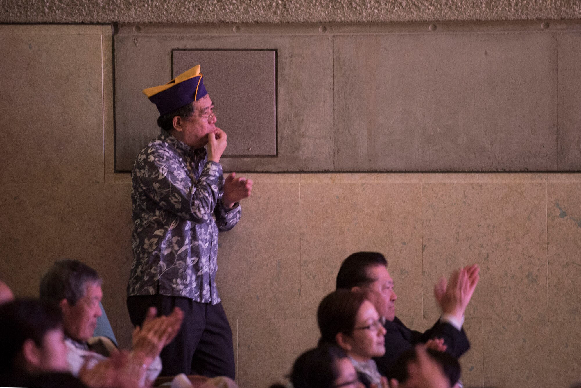 Okinawan residents applaud the U.S. Air Force band of the Pacific-Asia jazz ensemble March 14, 2016, at the Pallet Civic Theatre at Naha, Japan. More than 300 local Okinawans attended the event. (U.S. Air Force photo by Senior Airman Omari Bernard)