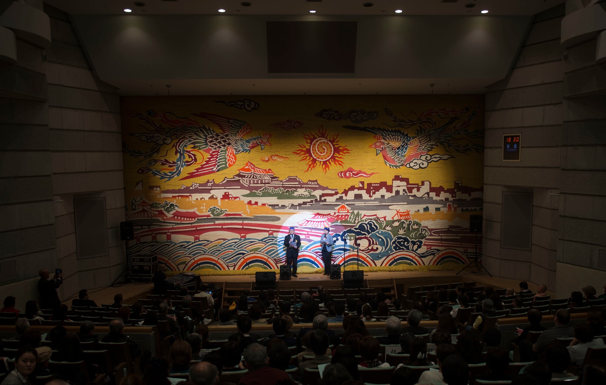 Okinawan Keystone Lions Club members introduce the U.S. Air Force Band of the Pacific-Asia???s Pacific Showcase ensemble March 14, 2016, at the Pallet Civic Theater in Naha, Japan. The Pacific Showcase appeals to a wide variety of audiences through the unique American art form of jazz music. (U.S. Air Force photo by Senior Airman Omari Bernard)