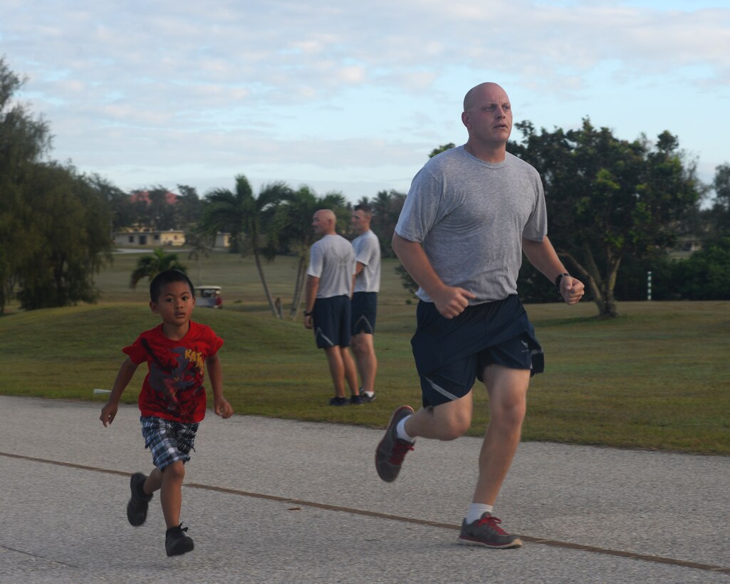Runners in the Loose Change 5k run to the finish line March21, 2016, at Andersen Air Force Base, Guam. The 5k kicked of Andersen AFB’s support of the Air Force Assistance Fund, which is powered by Airmen and aims to take care of Airmen in need.(U.S. Air Force photo/Airman 1st Class Jacob Skovo)