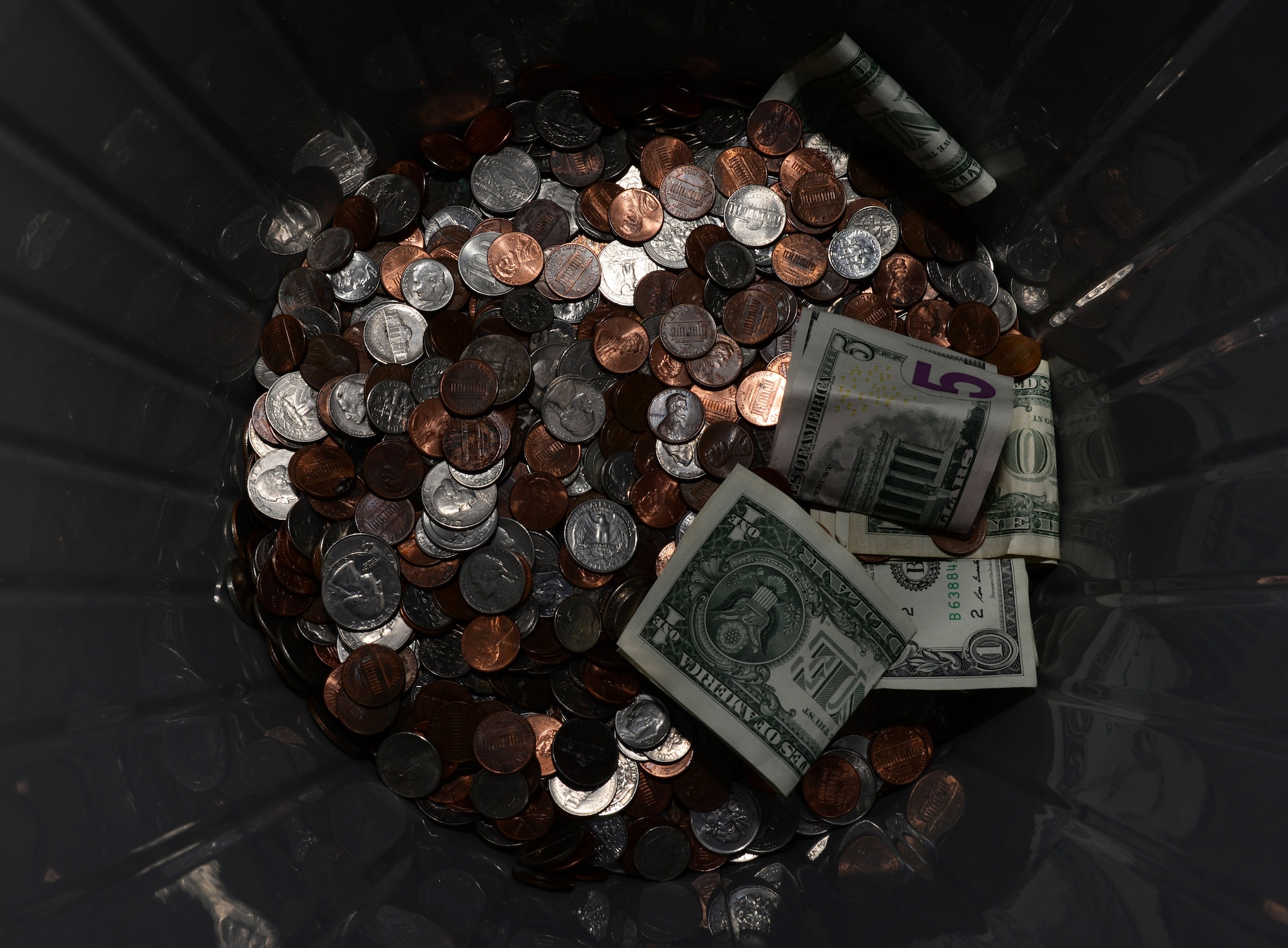 Participants of the Loose Change 5k donated their spare change to the Air Force Assistance Fund 21 March, 2016, at Andersen Air Force Base, Guam. The AFAF provides support to active duty, retiree, reserve and guard Airmen and dependents, including surviving spouses in need of financial aid. (U.S. Air Force photo/Airman 1st Class Jacob Skovo)