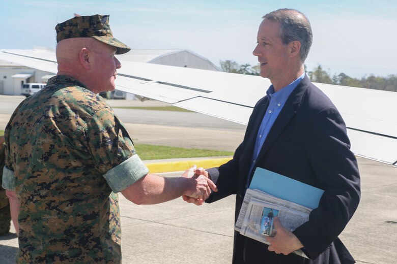 Maj. Gen. Walter L. Miller Jr., left, the commanding general of II Marine Expeditionary Force, welcomes Rep. Mac Thornberry, right, at Marine Corps Air Station New River, N.C., March 18, 2016. Thornberry met with senior leaders and junior Marines from units with II MEF to discuss readiness, personnel, and equipment-related issues. (U.S. Marine Corps photo by Cpl. Lucas Hopkins/Released)