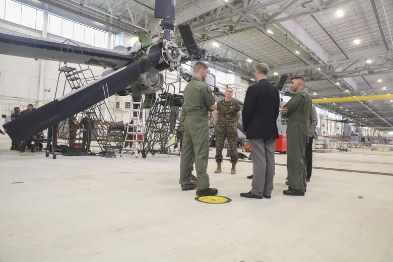 Rep. Mac Thornberry, center-right, discusses maintenance and readiness issues with Marines from Marine Medium Tiltrotor Squadron 264 at Marine Corps Air Station New River, N.C., March 18, 2016. Thornberry also serves as the Chairman of the House Armed Services Committee, and met with units from across II Marine Expeditionary Force to discuss force-related topics. (U.S. Marine Corps photo by Cpl. Lucas Hopkins/Released)