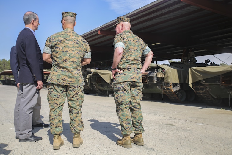 Rep. Mac Thornberry, left, speaks with Lt. Col. Robert Bodisch, center, the commanding officer of 2nd Tank Battalion, and Maj. Gen. Walter L. Miller Jr., right, the commanding general of II Marine Expeditionary Force, at Marine Corps Base Camp Lejeune, N.C., March 18, 2016. Thornberry is also the Chairman of the House Armed Services Committee, and met with units from II MEF to discuss readiness, personnel and equipment-related issues. (U.S. Marine Corps photo by Cpl. Lucas Hopkins/Released)