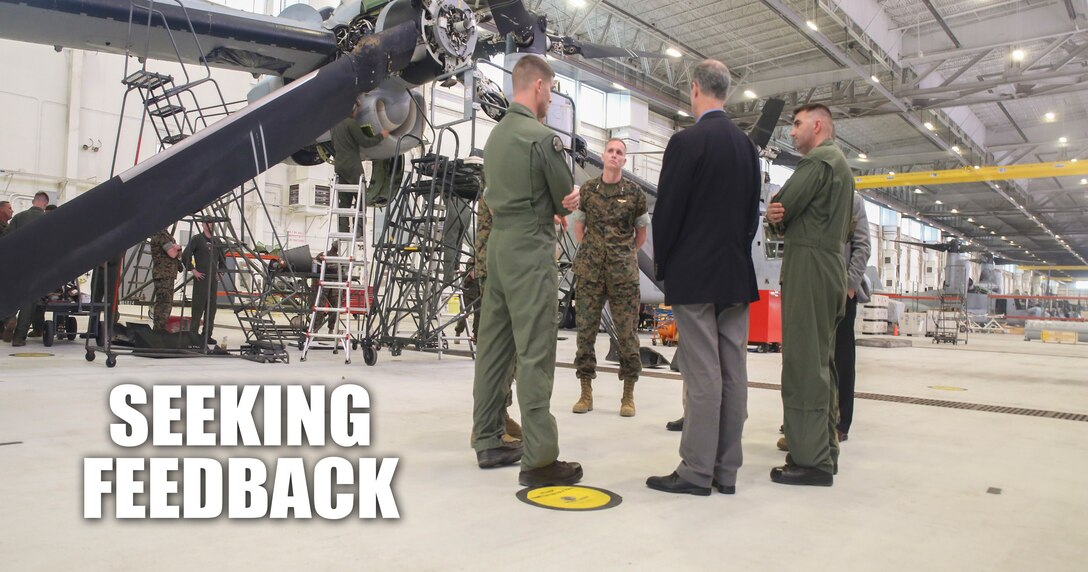 Rep. Mac Thornberry, center-right, discusses maintenance and readiness issues with Marines from Marine Medium Tiltrotor Squadron 264 at Marine Corps Air Station New River, N.C., March 18, 2016. Thornberry also serves as the Chairman of the House Armed Services Committee, and met with units from across II Marine Expeditionary Force to discuss force-related topics. (U.S. Marine Corps photo illustration by Cpl. Lucas Hopkins/Released)