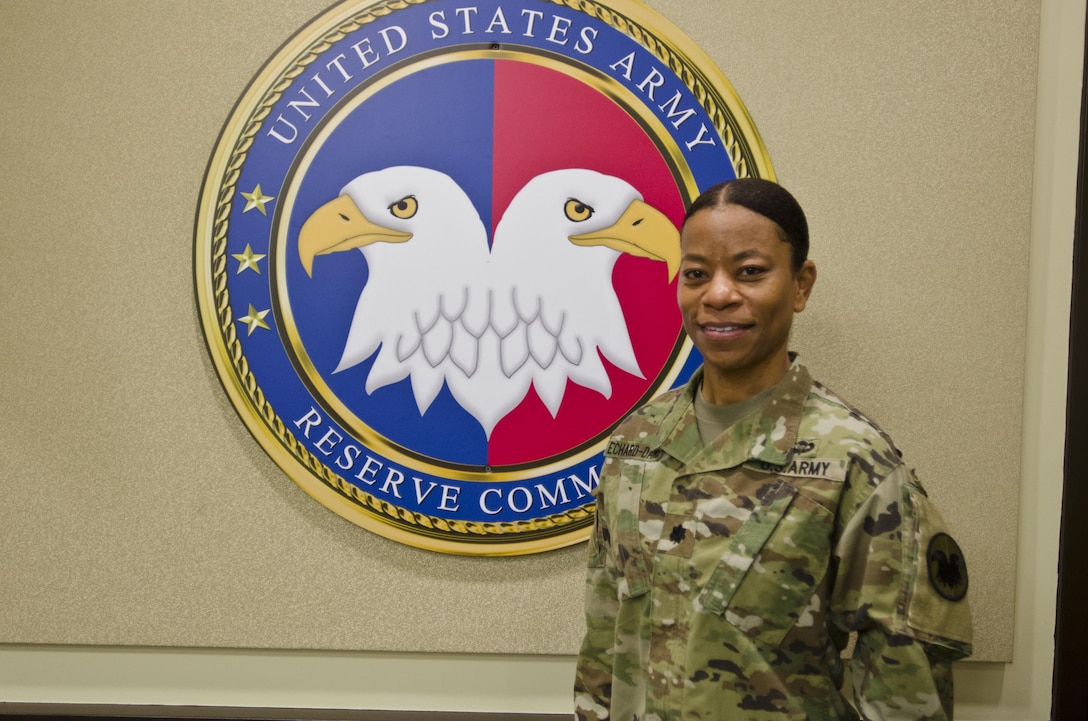 Lt. Col. Dianna Echard-Danis, detail inspector general with the U.S. Army Reserve Command, who credits much of her success in the military to inspirational women who have come before her, poses for a photo at USARC headquarters, Fort Bragg, N.C., March 8, 2016. Danis spoke about her personal journey in the Army and how both men and women can use certain characteristics to join the inspector general directorate as she did. (U.S. Army Reserve photo by Brian Godette, USARC Public Affairs)
