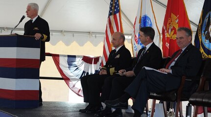 DAHLGREN, Va. - Vice Admiral Terry Benedict, Navy Strategic Systems Programs (SSP) director, tells Naval Surface Warfare Center Dahlgren Division (NSWCDD) personnel that their efforts are "absolutely critical to the defense of our country" during a ground breaking ceremony for the new Missile Support Facility, March 18. "Once completed, this $22.7 million effort, 58,000-square-foot facility is going to house the SLBM (Submarine Launched Ballistic Missile) program offices and the labs for over 300 outstanding professionals in the fields of engineering, physics, math, statistics, computer science, and the list goes on," said Benedict, the event's keynote speaker, as (left to right) NSWCDD Commanding Officer Capt. Brian Durant, Rep. Rob Wittman, R-Va., and Sen. Tim Kaine, D-Va., listen. NSWCDD has been a key member of the SLBM team since the program’s inception, and will continue throughout the next generation of submarine - the new Ohio-Replacement Program.