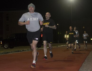 Army Reserve drill sergeants from the 108th Training Division (IET) participate in a timed three-mile run during the Drill Sergeant of the Year competition at Fort Jackson, S.C., March 22. The three-mile run was a surprise “mystery event” that was sprung on the contestants immediately following the Army Physical Fitness Test (APFT), which ended with a two-mile run just minutes beforehand. The purpose of the mystery events is to test the Soldiers on their ability to adapt to a rapidly changing environment. The top two winners of the contest will go on to compete in the TRADOC Drill Sergeant of the Year competition later this year at Fort Jackson, S.C. (U.S. Army photo by Sgt. Brandon Rizzo/released)