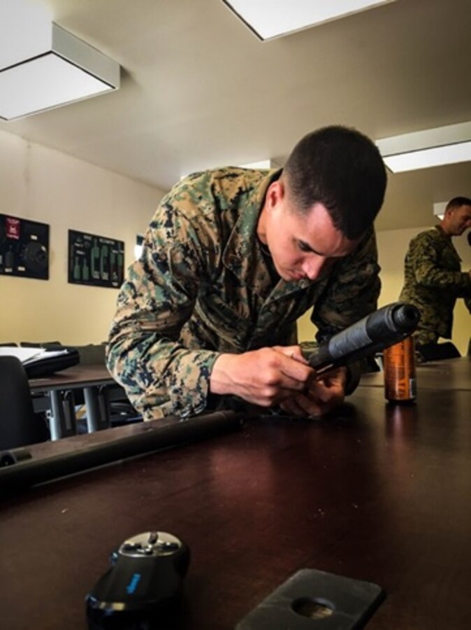On March 10, 2016 Second Lieutenant Nickolas Anthony, a Marine attached to Combat Engineer Officer course 3-16 (CEO 3-16) at Marine Corps Engineer School aboard Camp Lejeune, N.C.; assembles a M500 shotgun during an urban mobility breaching class. 