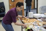 Juanita Kennett, Joint Base San Antonio-Randolph Chapel volunteer, sets the table for a Lent luncheon March 9 at the JBSA-Randolph Chapel. Volunteers contributed 42,000 hours of service to the chapel last year, the highest number of all volunteer groups at JBSA-Randolph.