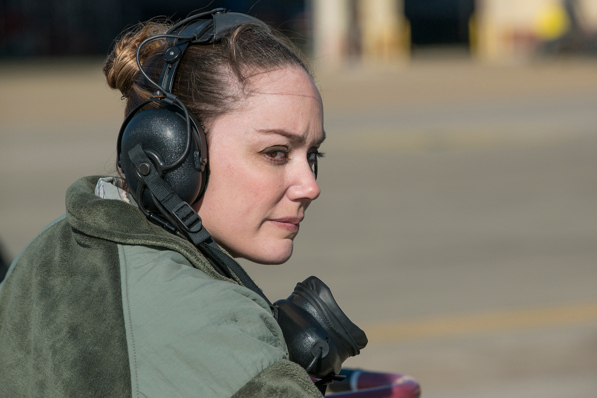 U.S. Air Force Tech. Sgt. Megan Nelson, 2nd Maintenance Squadron crew chief, prepares to marshal a B-52H Stratofortress from its parking spot for a mission on Mar. 22, 2013, Barksdale Air Force Base, La. In recognition of Women’s History Month, the Air Force Reserve Command’s 307th Bomb Wing and Barksdale’s 2nd Bomb Wing launched two B-52H Stratofortress bombers flown by two all-female aircrews made up from members of the Air Force Reserve Command’s 93rd and 343rd Bomb Squadrons and the 2nd Bomb Wing’s 11th, 20th and 96th Bomb Squadrons. (U.S. Air Force photo by Master Sgt. Greg Steele/Released)