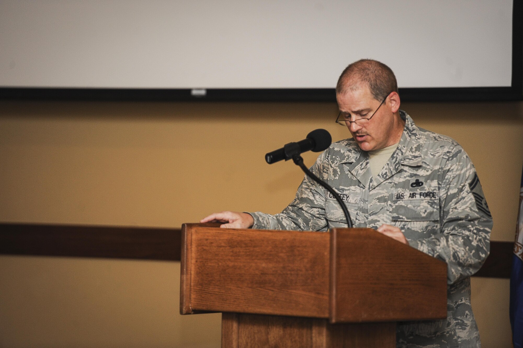 Senior Master Sgt. Timothy Coffey, centralized repair facility superintendent with the 1st Special Operations Maintenance Squadron, introduces special guests during an Air Force Assistance Fund breakfast at Hurlburt Field, Fla., March 17, 2016. The breakfast helped raise awareness of the upcoming Air Force Special Operations Command AFAF campaign, March 21-April 29. The AFAF raises money for charitable affiliates that provide support to Air Force families in need. The four charities that benefit from the AFAF are the Air Force Village, Air Force Enlisted Village, the LeMay Foundation and the Air Force Aid Society. (U.S. Air Force photo by Senior Airman Meagan Schutter)