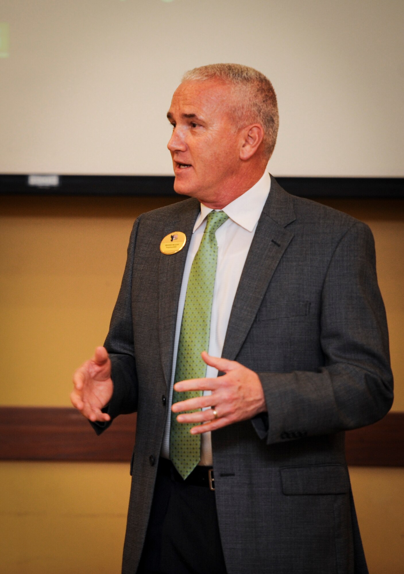 Retired Chief Master Sgt. Brooke McLean, president and CEO of the Air Force Enlisted Village, speaks to attendees to raise awareness about the AFEV during an Air Force Assistance Fund breakfast at Hurlburt Field, Fla., March 17, 2016. The AFAF raises money for charitable affiliates that provide support to Air Force families in need. The AFEV is one of four charitable affiliate organizations of AFAF whose core mission is to provide a safe, secure home for surviving spouses of retired enlisted U.S. Airmen. (U.S. Air Force photo by Senior Airman Meagan Schutter)