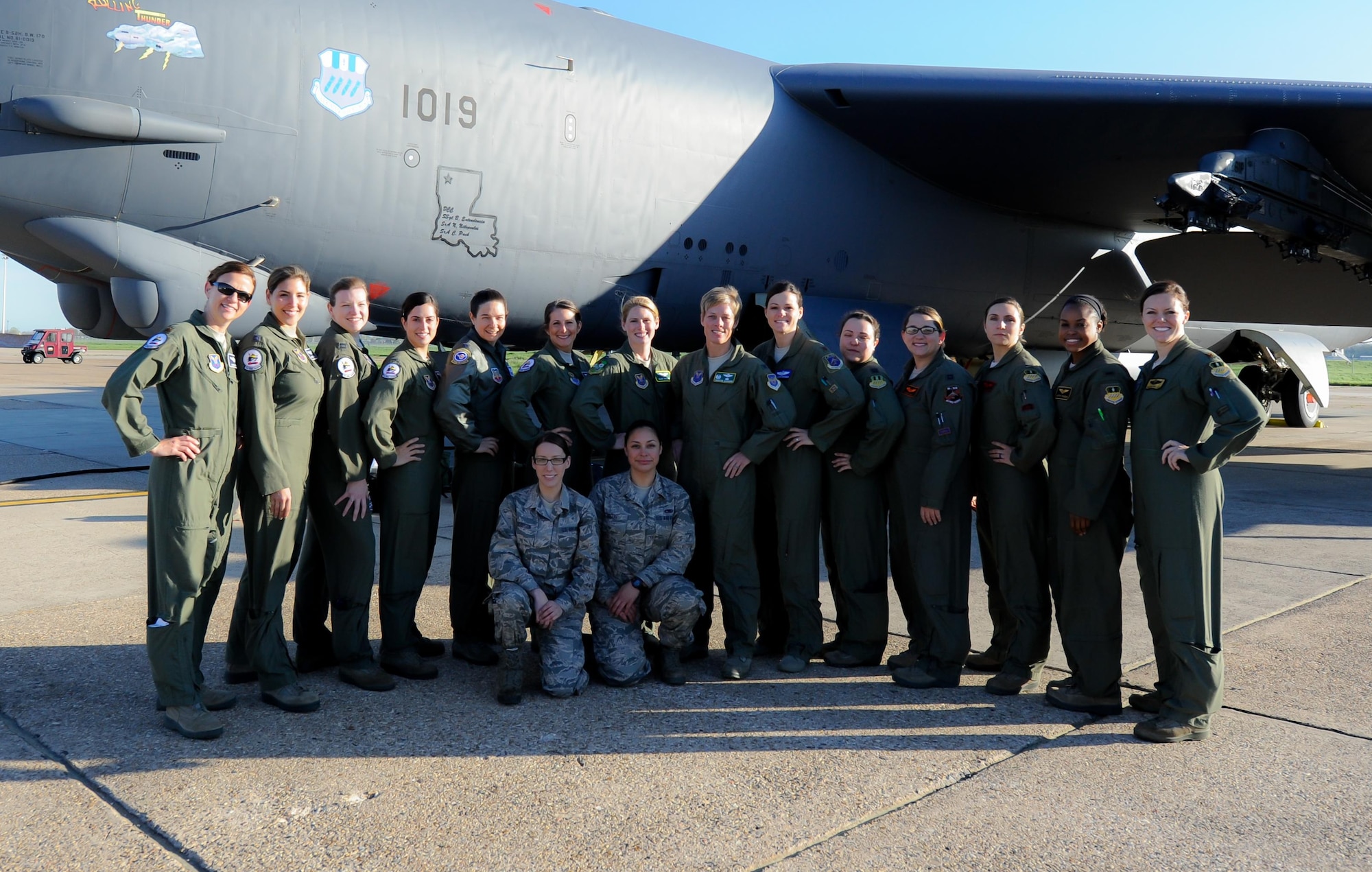 Fourteen aircrew members to include Col. Kristin Goodwin, 2nd Bomb Wing commander, and crew chiefs pose for a photo on the flightline at Barksdale Air Force Base, La., March 22, 2016. To celebrate women’s history month, two all-female aircrews were assembled to make U.S. Air Force history. (U.S. Air Force photo/2nd Lt. Jessica Adams)