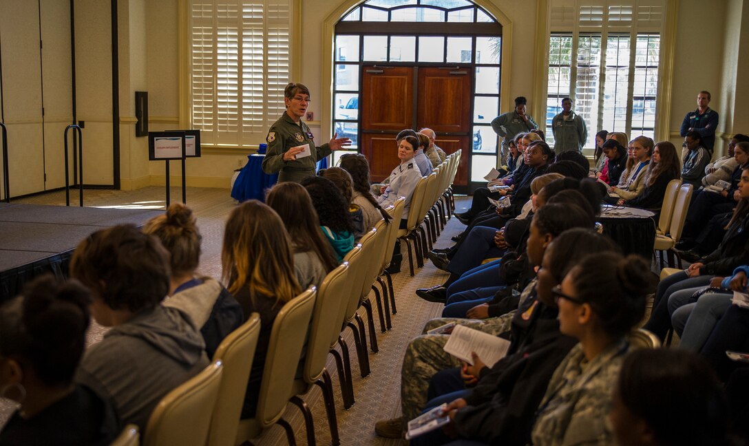 Col. Caroline Evernham, 315th Operations Group commander, speaks with girls at the Women in Aviation Career Day. Over 130 middle and high school girls from 12 Lowcountry schools visited Joint Base Charleston March 22 to learn about jobs in aviation as part of the 315th Airlift Wing’s 9th annual Women in Aviation Career Day. (U.S. Air Force photo by Senior Airman Jonathan Lane)